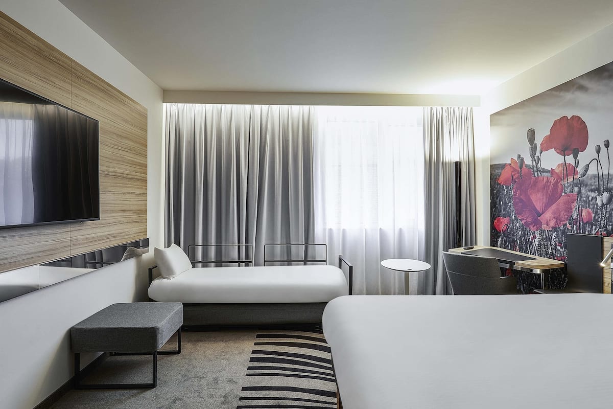 family double room, 1 double bed with sofa bed (family) | minibar, in-room safe, desk, blackout curtains