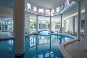 4 indoor pools, 2 outdoor pools, open 8:00 AM to 9:00 PM, pool umbrellas