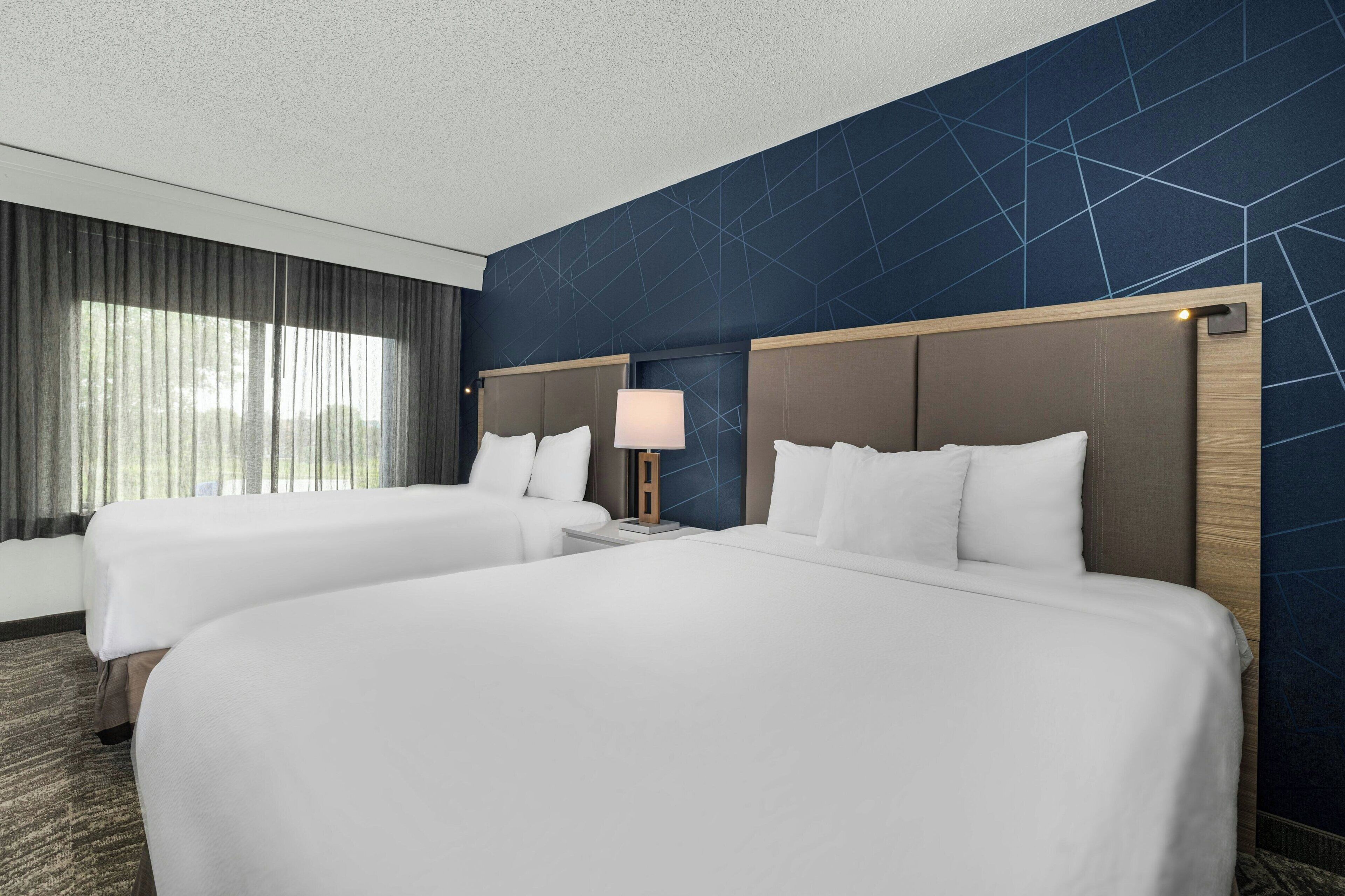 suite, multiple beds | 1 bedroom, in-room safe, desk, laptop workspace