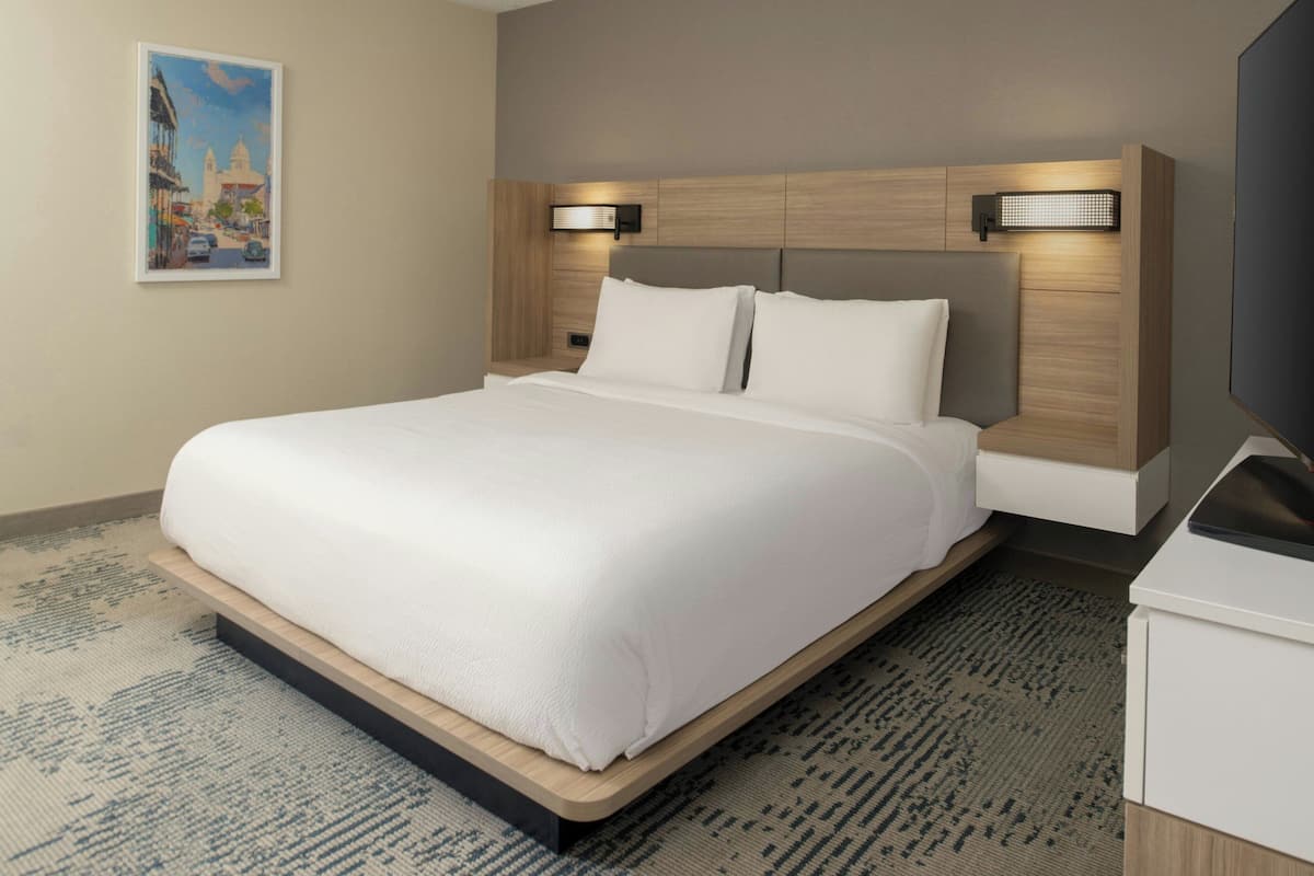 Desk, blackout curtains, iron/ironing board, free cots/infant beds