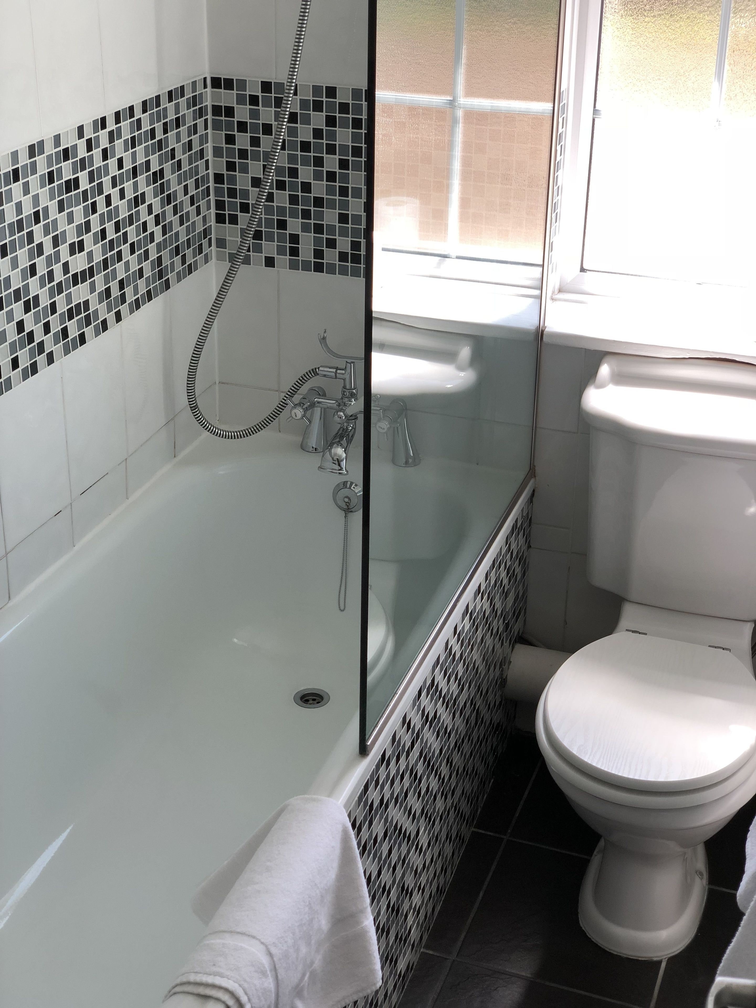 superior double room | bathroom | free toiletries, hair dryer, towels