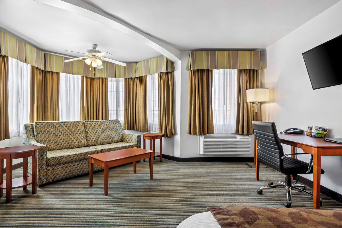 deluxe room, 1 king bed with sofa bed, non smoking, refrigerator & microwave (with sofabed) | desk, iron/ironing board, cots/infant beds, wifi