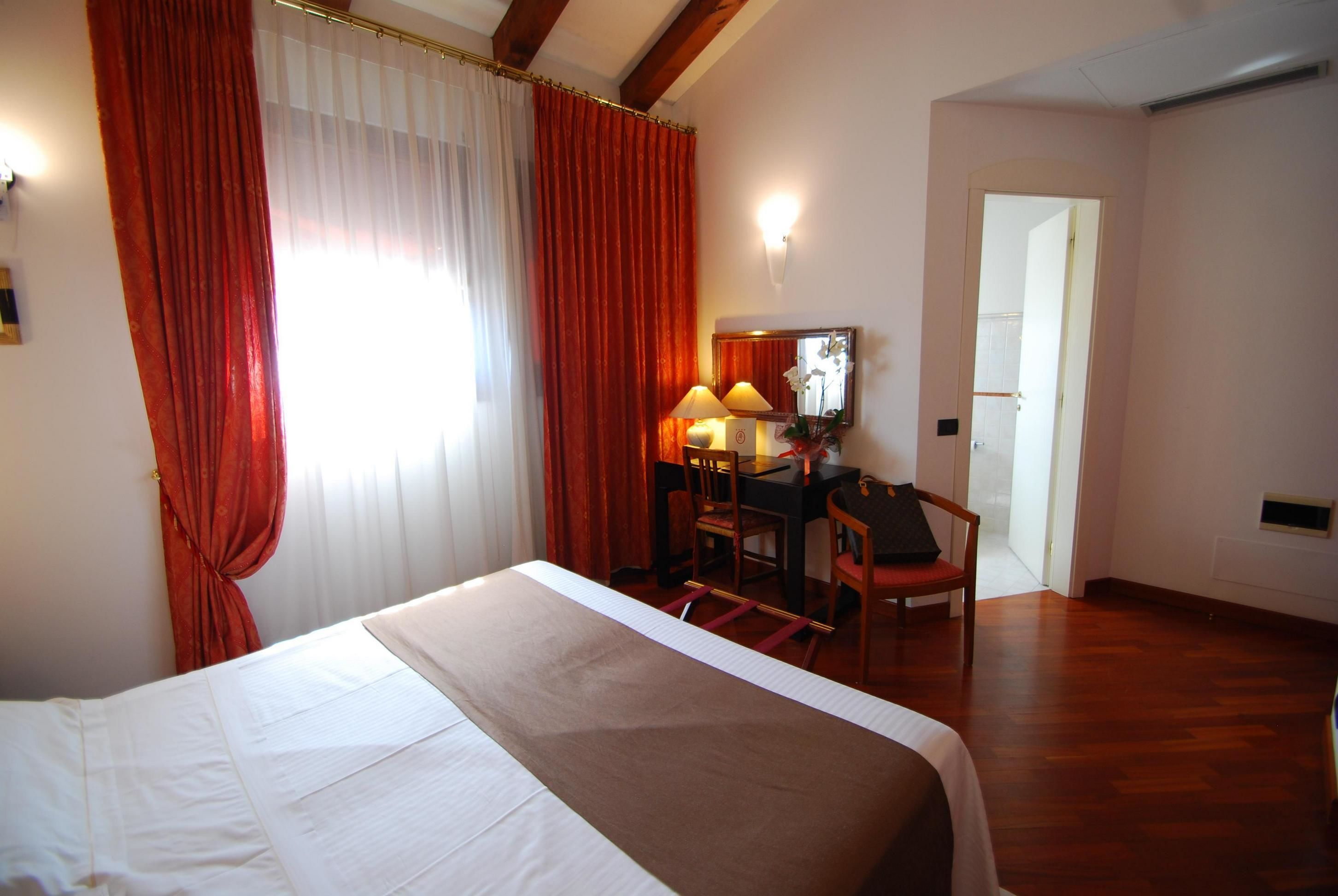 1 bedroom, down duvets, minibar, individually furnished