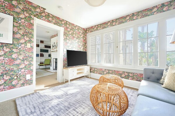 Suite, 1 Queen Bed with Sofa bed | Living room | Flat-screen TV