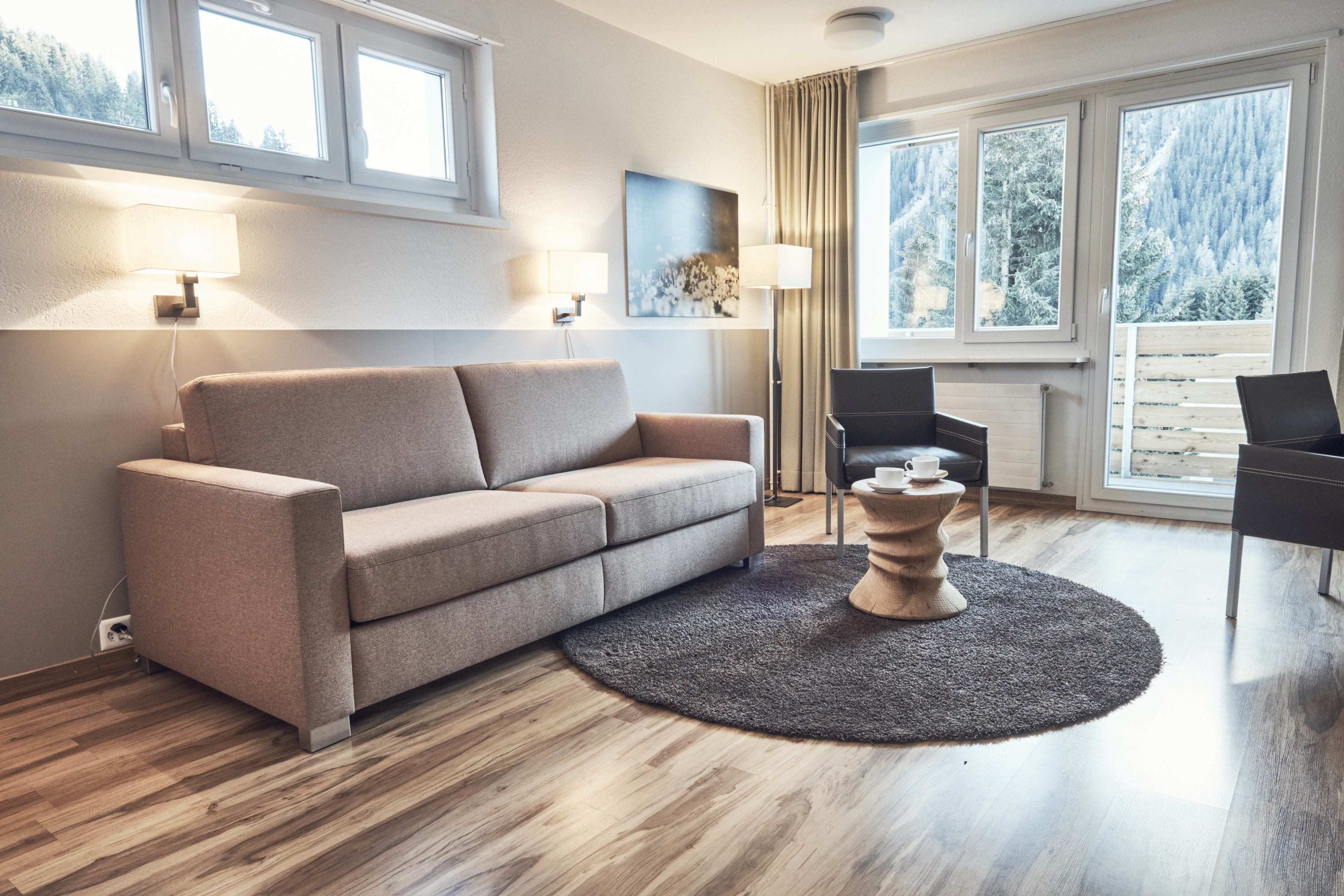 comfort apartment, 1 bedroom | living room | 42-inch flat-screen tv with cable channels, tv, dvd player