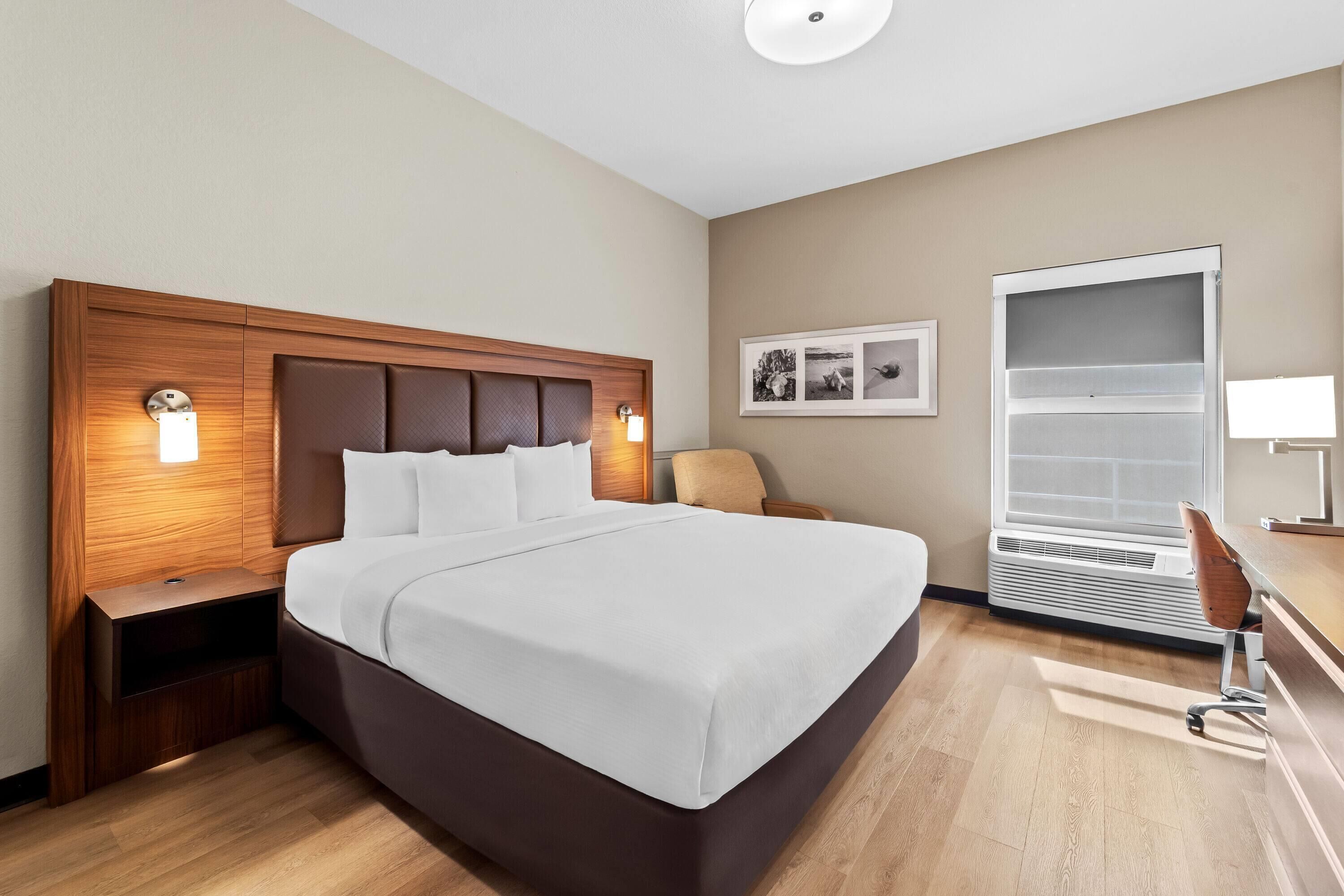 Premium bedding, desk, blackout drapes, iron/ironing board