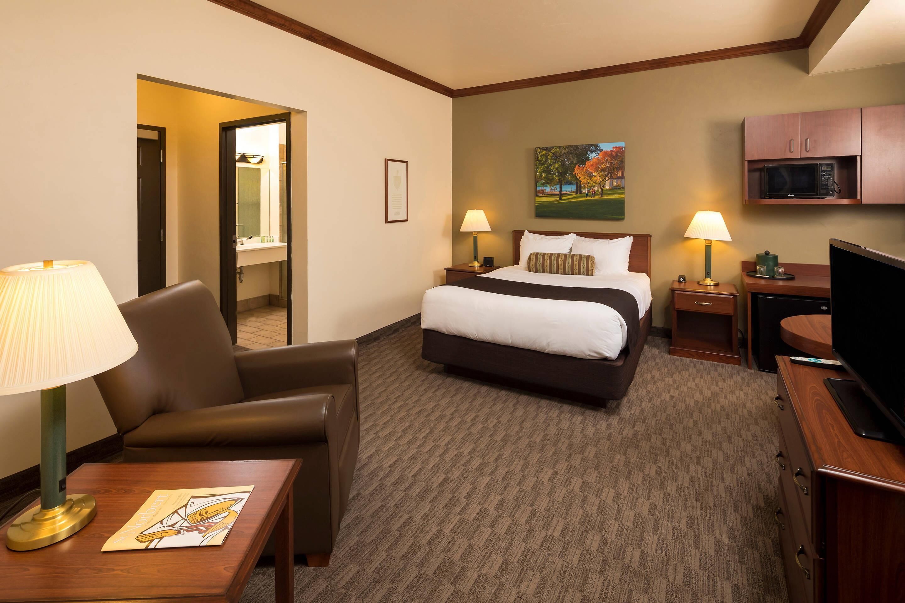 Suite, 1 Queen Bed, Non Smoking | In-room safe, desk, blackout drapes, iron/ironing board
