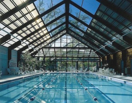 Indoor pool, 2 outdoor pools, open 8:00 AM to 10:00 PM, pool umbrellas. The Villas of Amelia Island