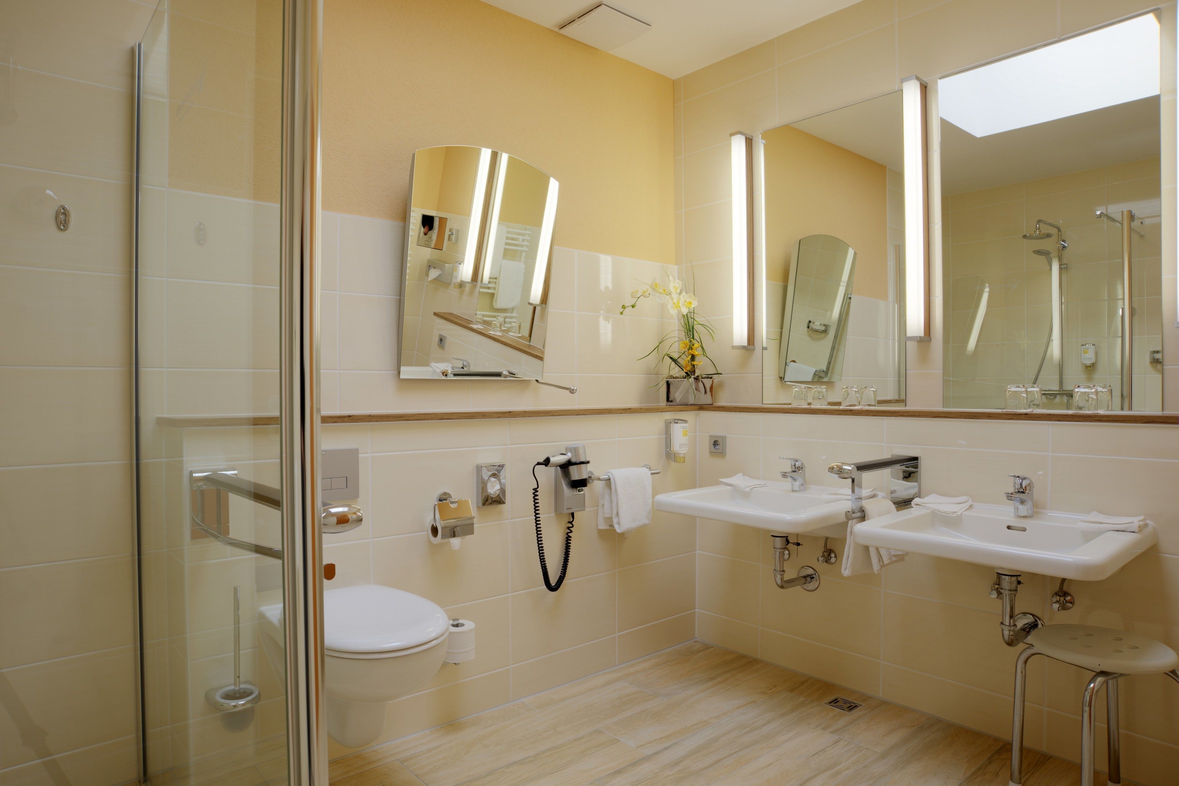 quadruple room | bathroom | rainfall showerhead, free toiletries, hair dryer, towels