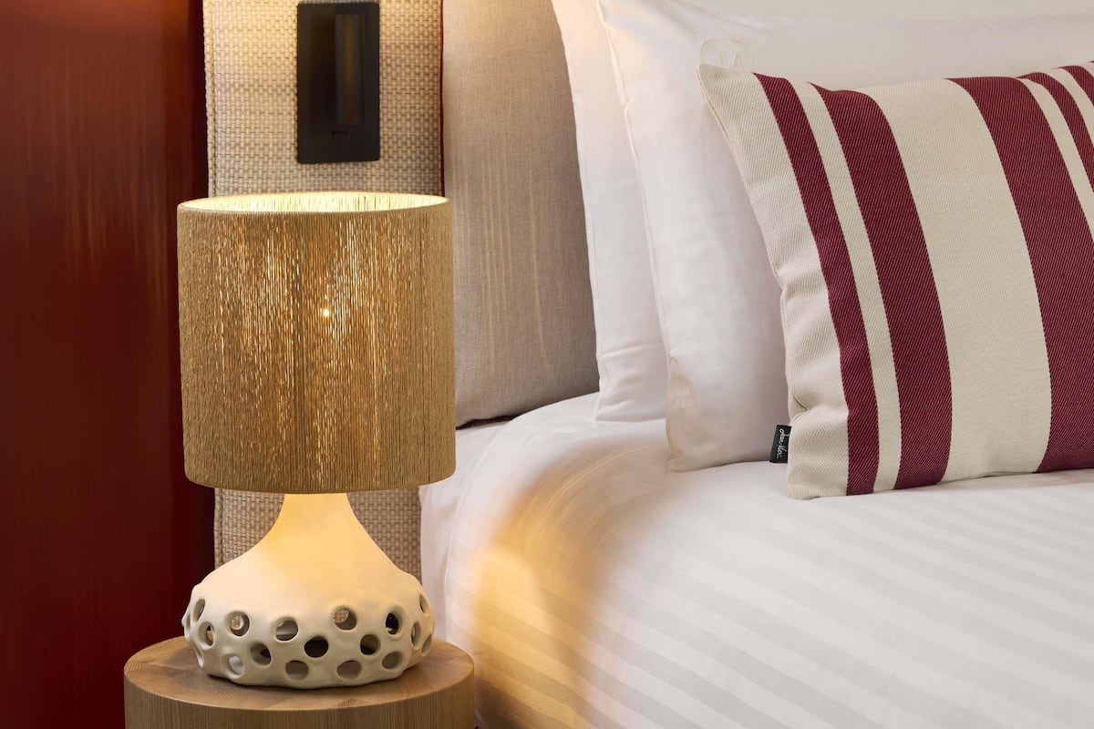 Premium bedding, down comforters, minibar, in-room safe