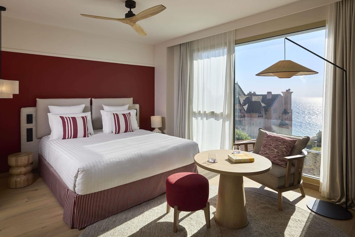 Deluxe Room, 1 King Bed, Ocean View | Premium bedding, down comforters, minibar, in-room safe