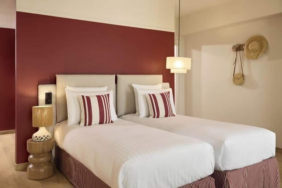 Premium bedding, down duvets, minibar, in-room safe