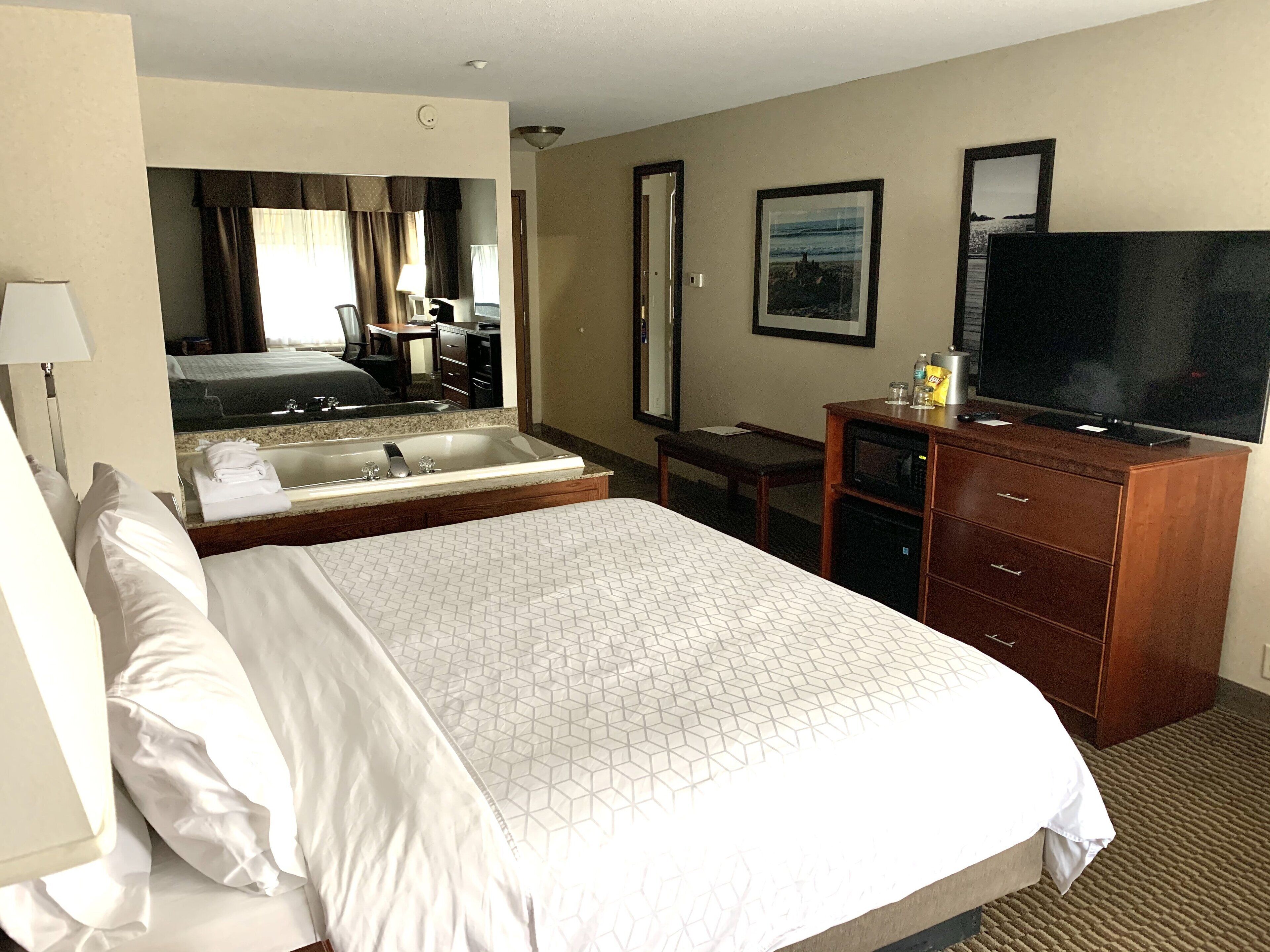 room, 1 king bed, non smoking, jetted tub | individually decorated, desk, laptop workspace, iron/ironing board