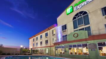 A Holiday Inn Express hotel with a swimming pool.