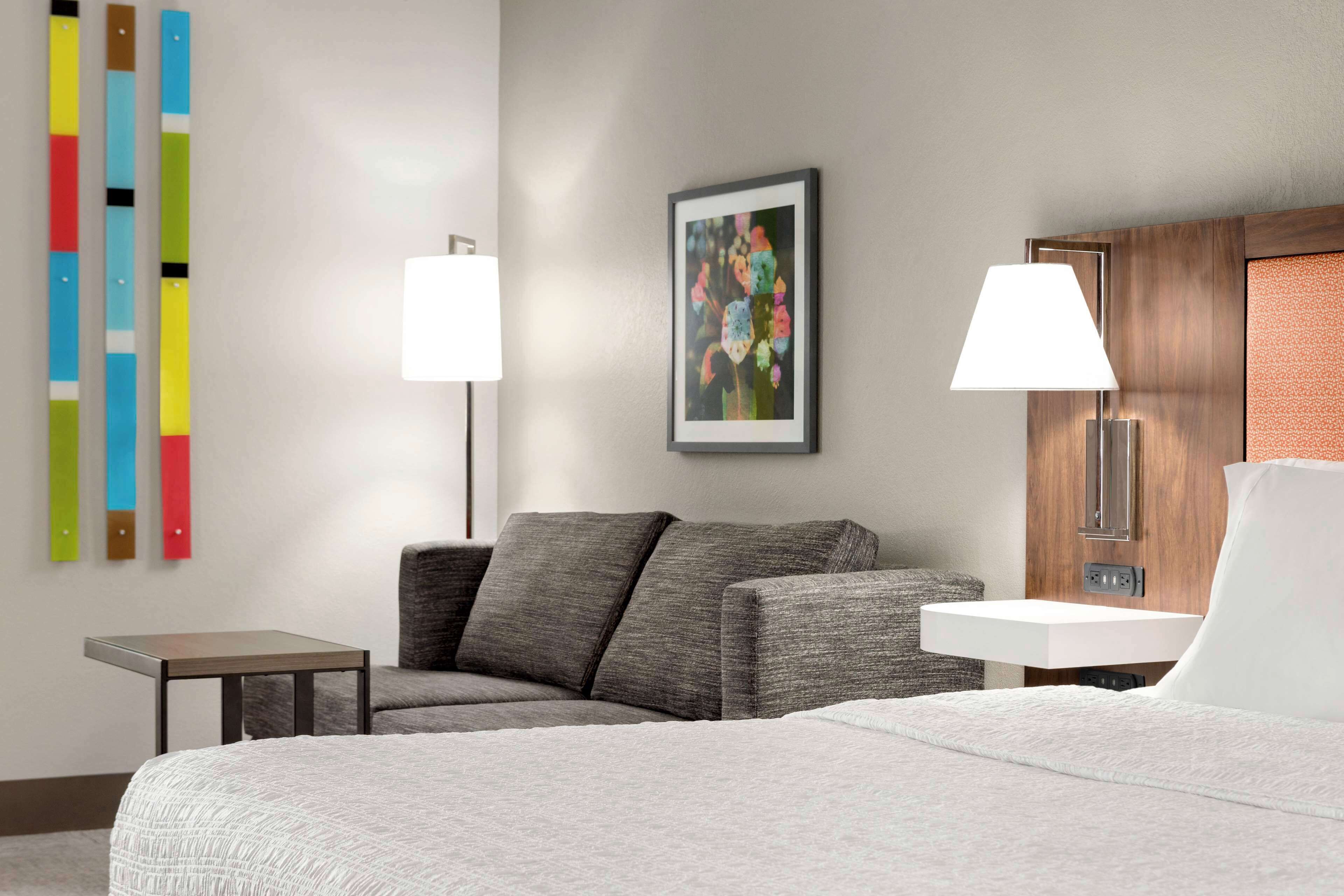 studio, 1 king bed with sofa bed, non smoking | living area | video game console, pay films