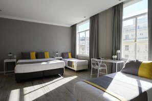 Quadruple Room | Down comforters, pillowtop beds, in-room safe, individually decorated