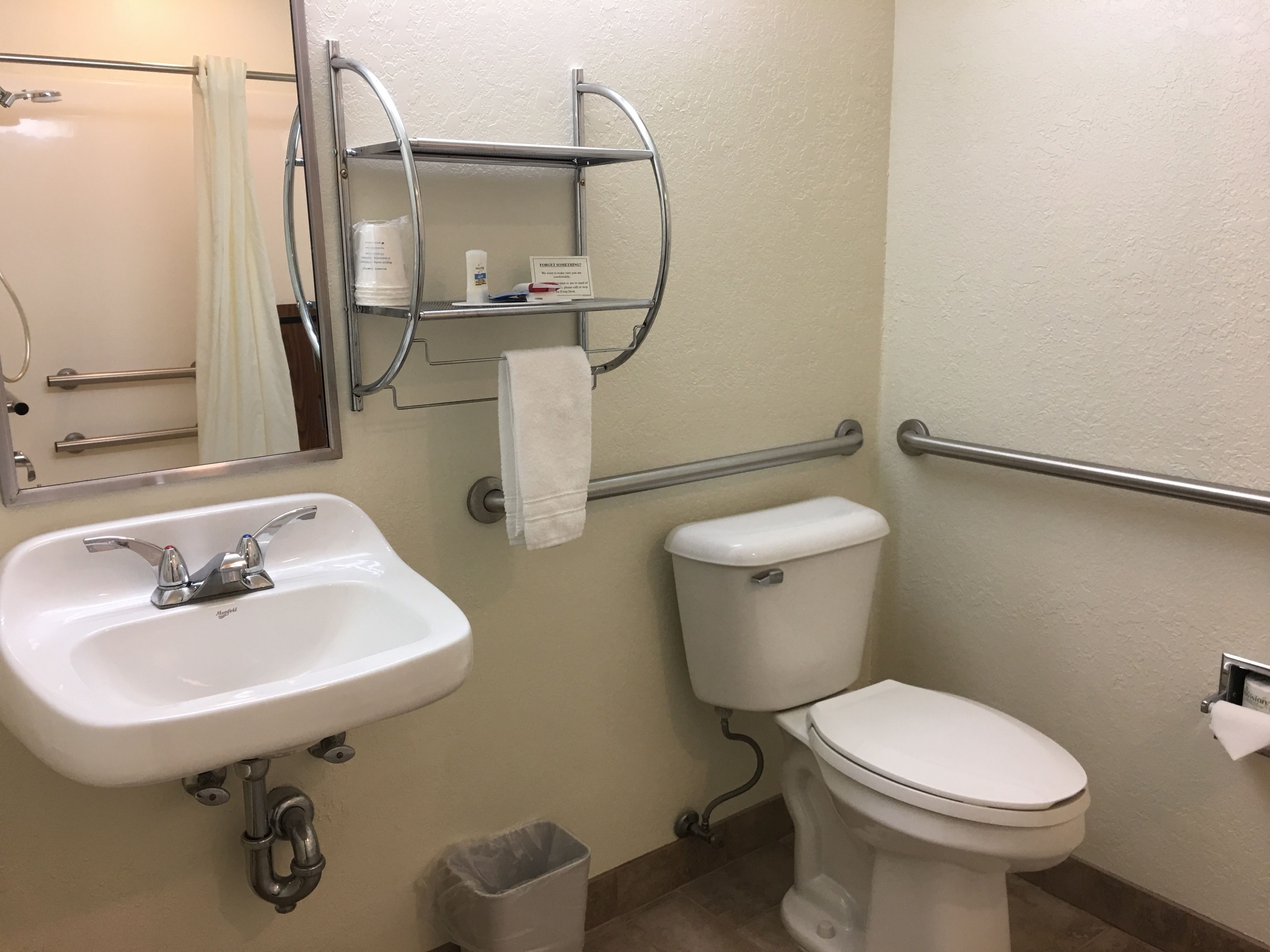 combined shower/bathtub, free toiletries, hair dryer, towels