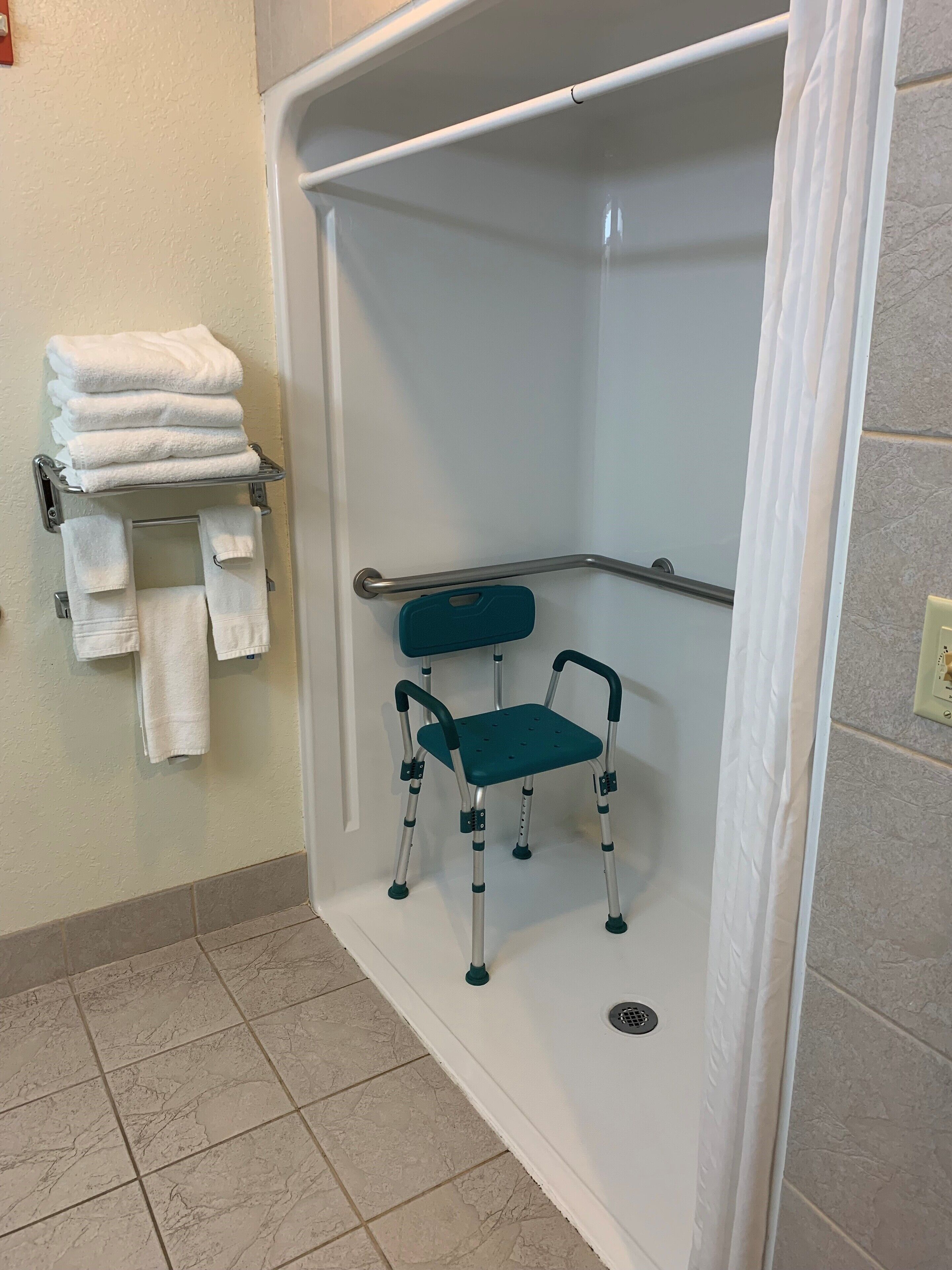 room, 2 queen beds, roll-in shower, non smoking | bathroom | combined shower/bathtub, free toiletries, hair dryer, towels