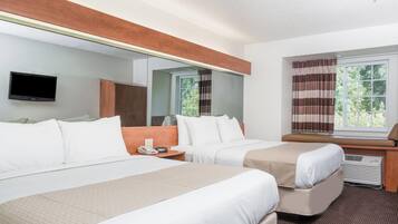 Down comforters, desk, blackout drapes, iron/ironing board