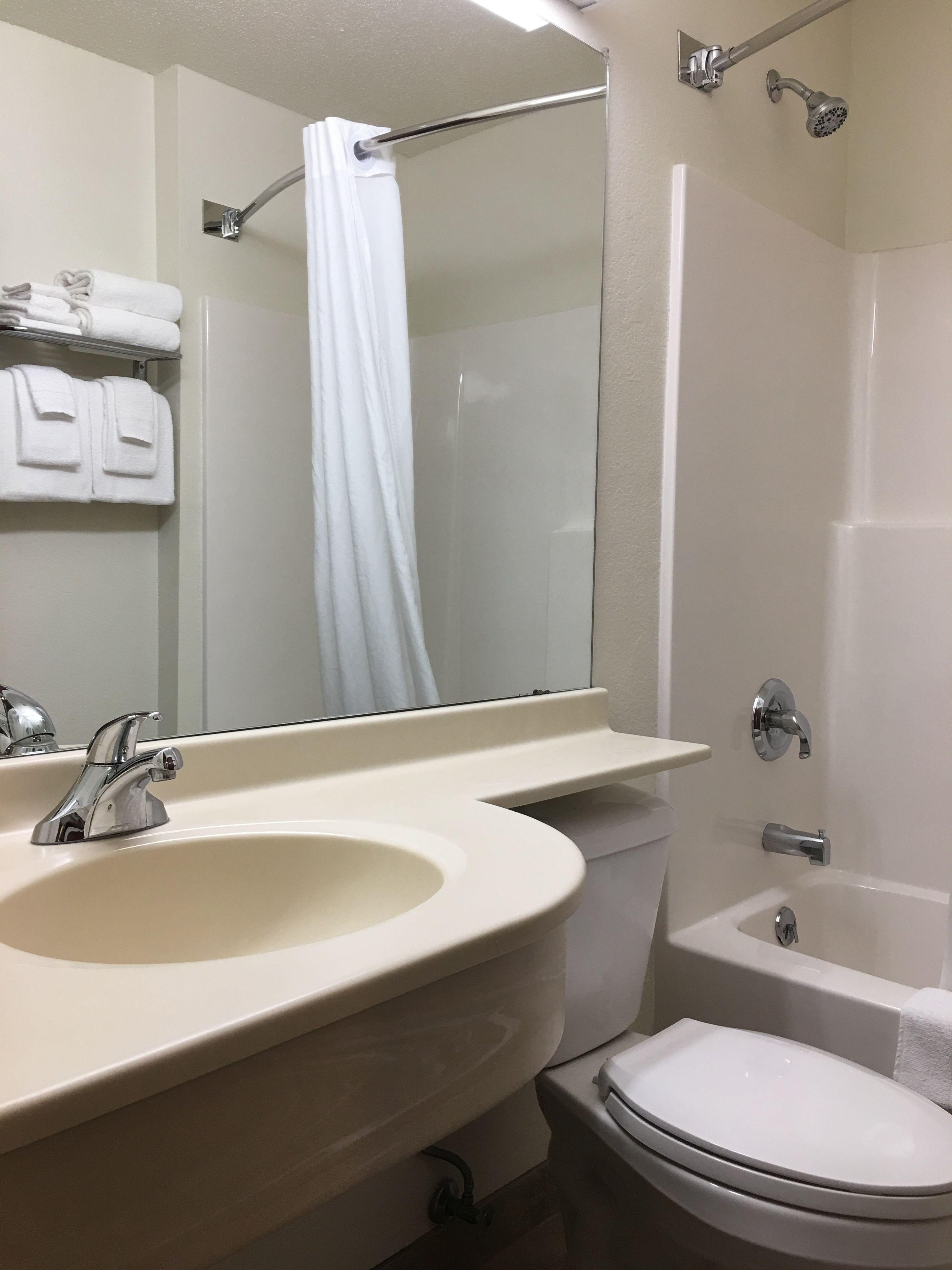 combined shower/bathtub, free toiletries, hair dryer, towels