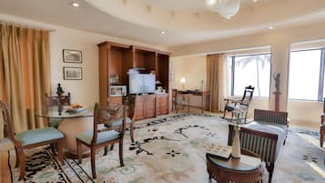 Luxury Suite, Ocean View, Beachside | Living area | 42-inch LED TV with satellite channels, TV