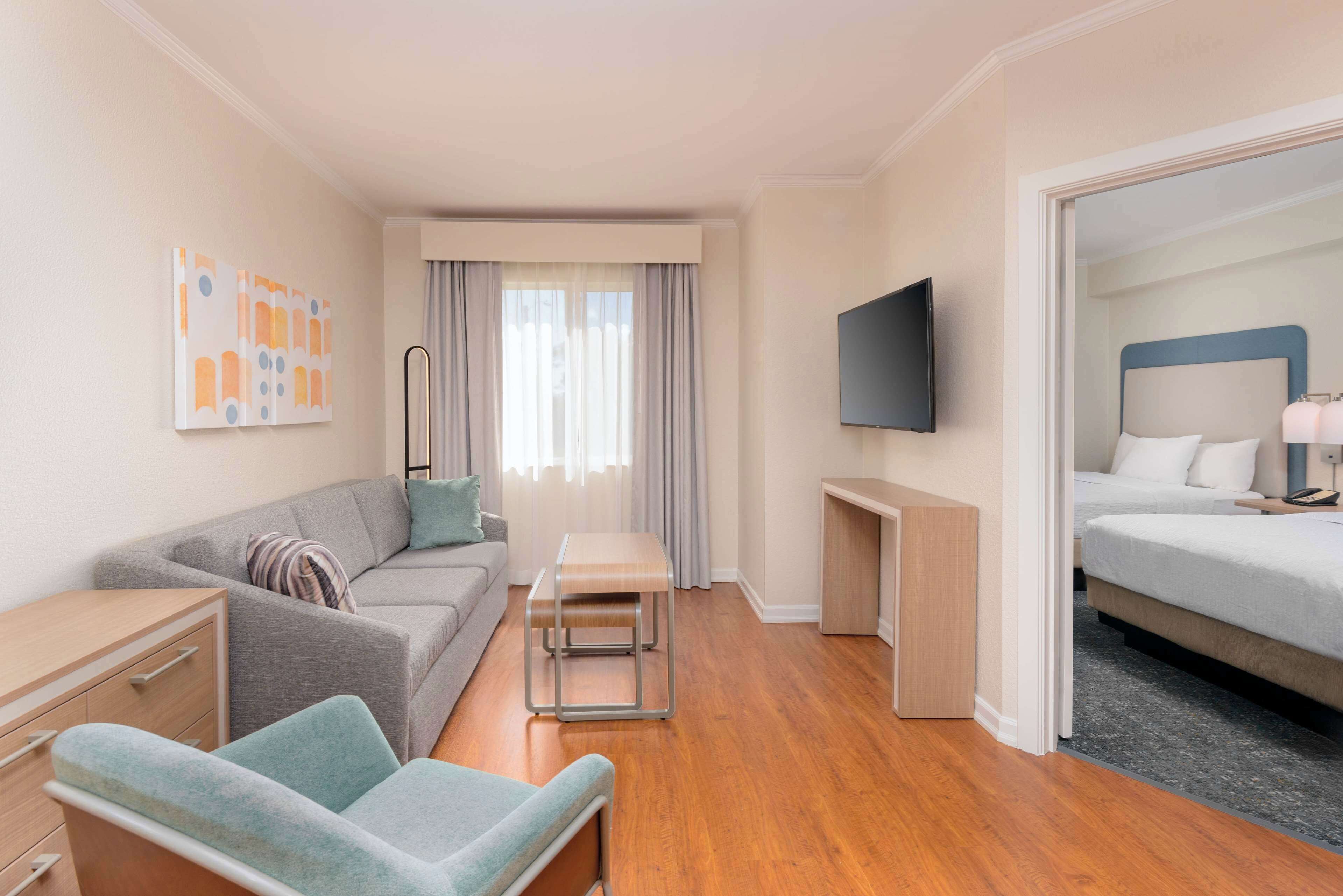 suite, 2 double beds | living area | lcd tv, mp3 dock