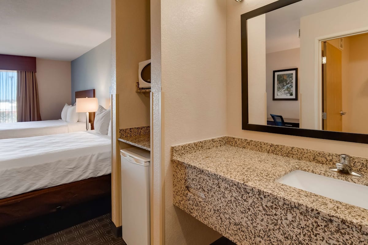 suite, multiple beds, non smoking, refrigerator & microwave (with sofabed) | in-room safe, laptop workspace, blackout curtains, iron/ironing board