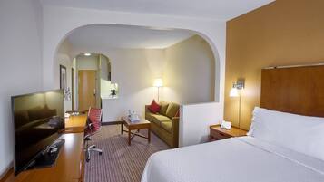 Desk, laptop workspace, blackout drapes, iron/ironing board