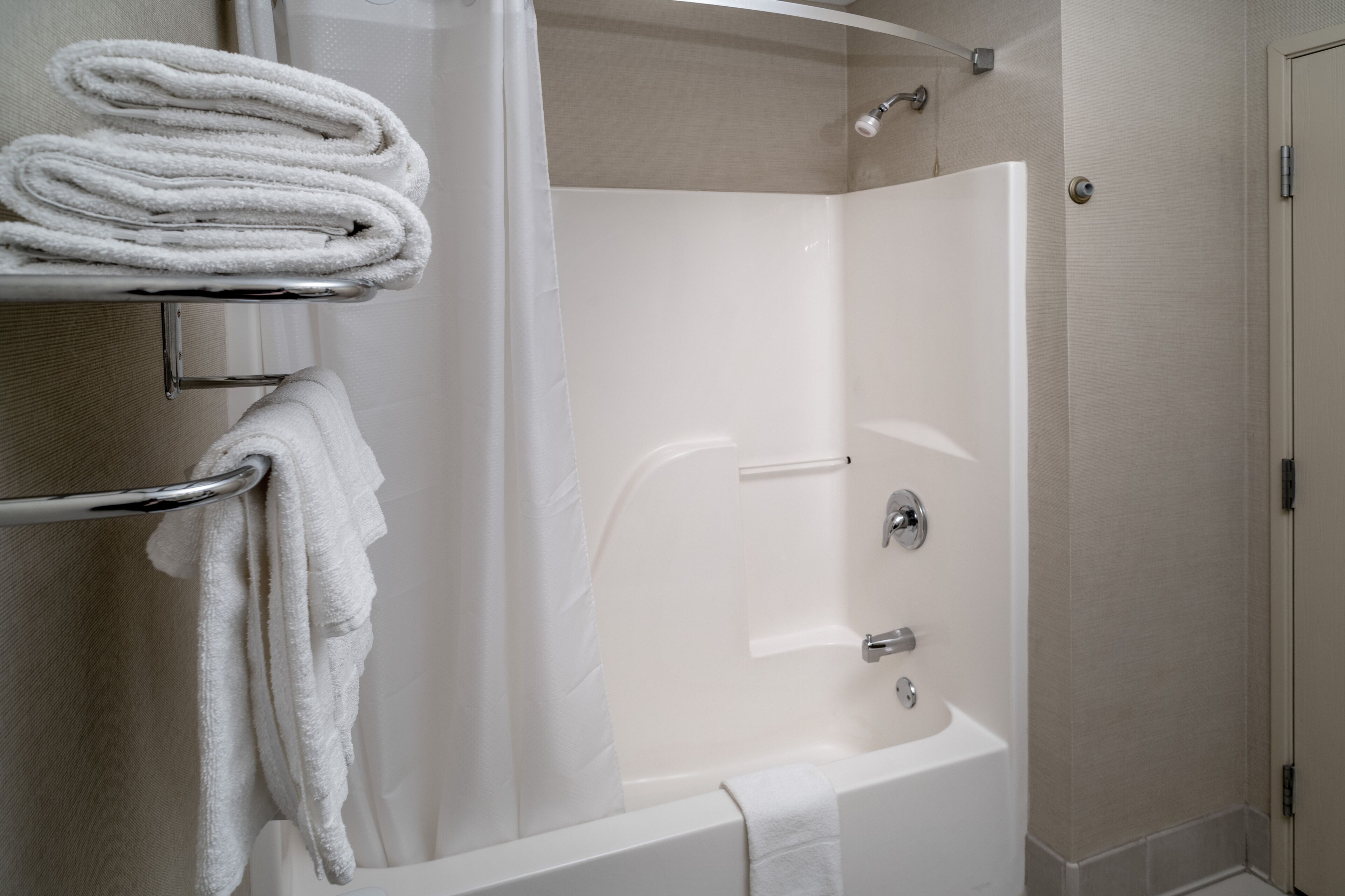 combined shower/bathtub, free toiletries, hair dryer, towels