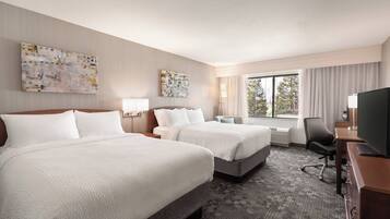 Hypo-allergenic bedding, memory-foam beds, desk, laptop workspace