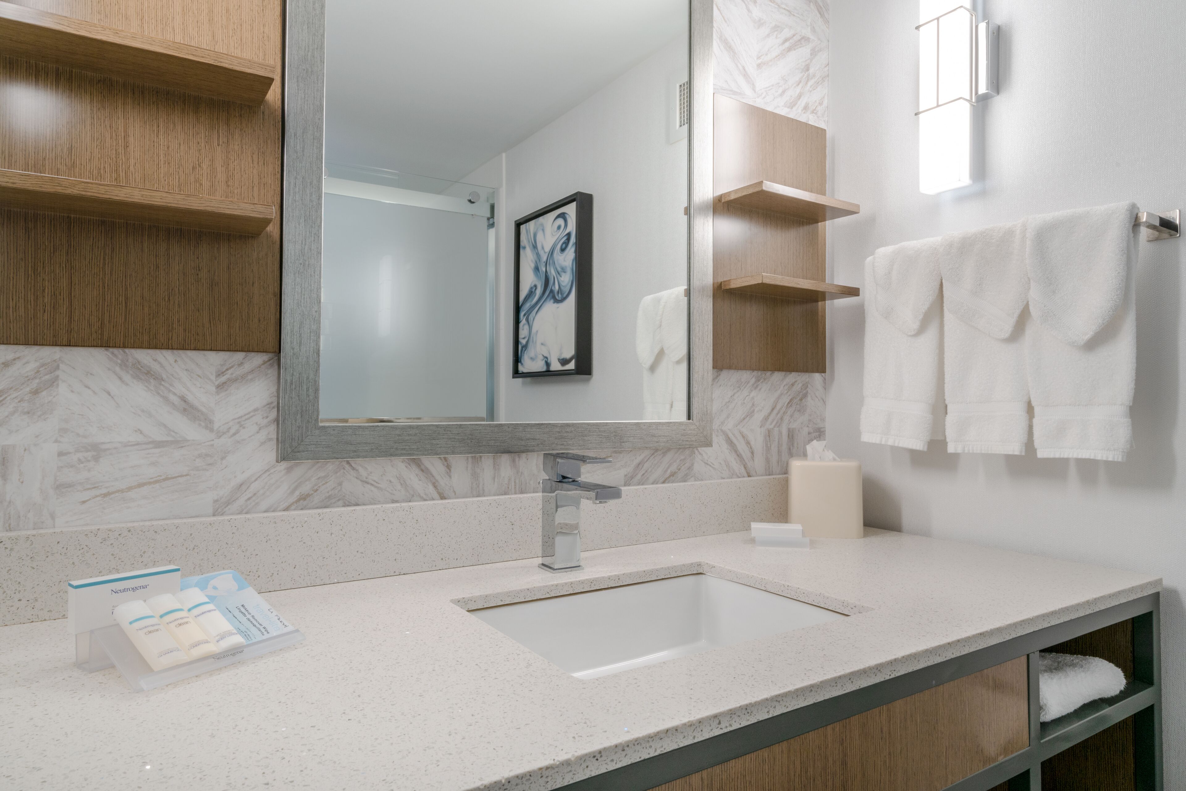 combined shower/bathtub, free toiletries, hair dryer, towels