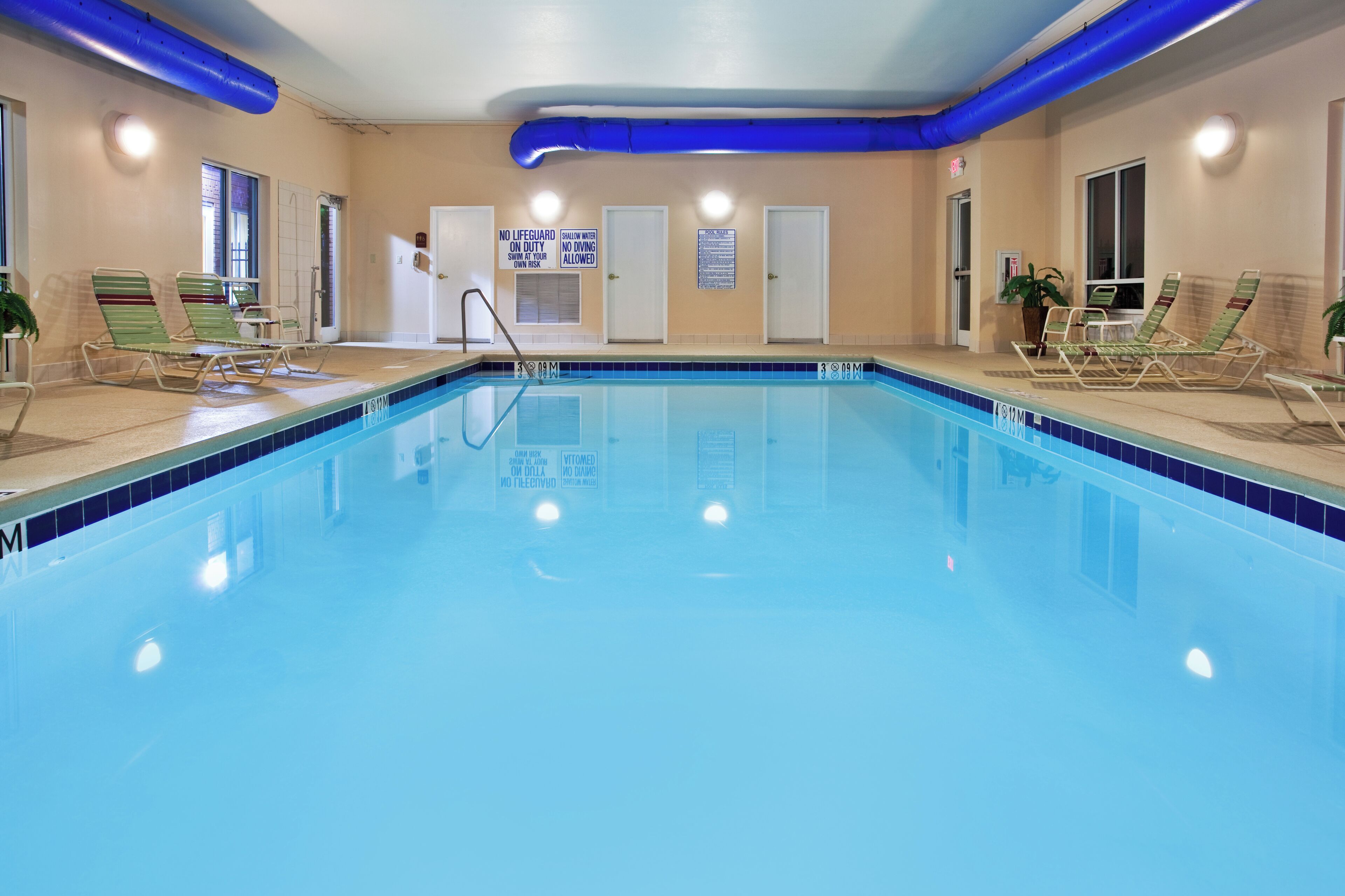 indoor pool, open 9:00 am to 9:00 pm, pool loungers