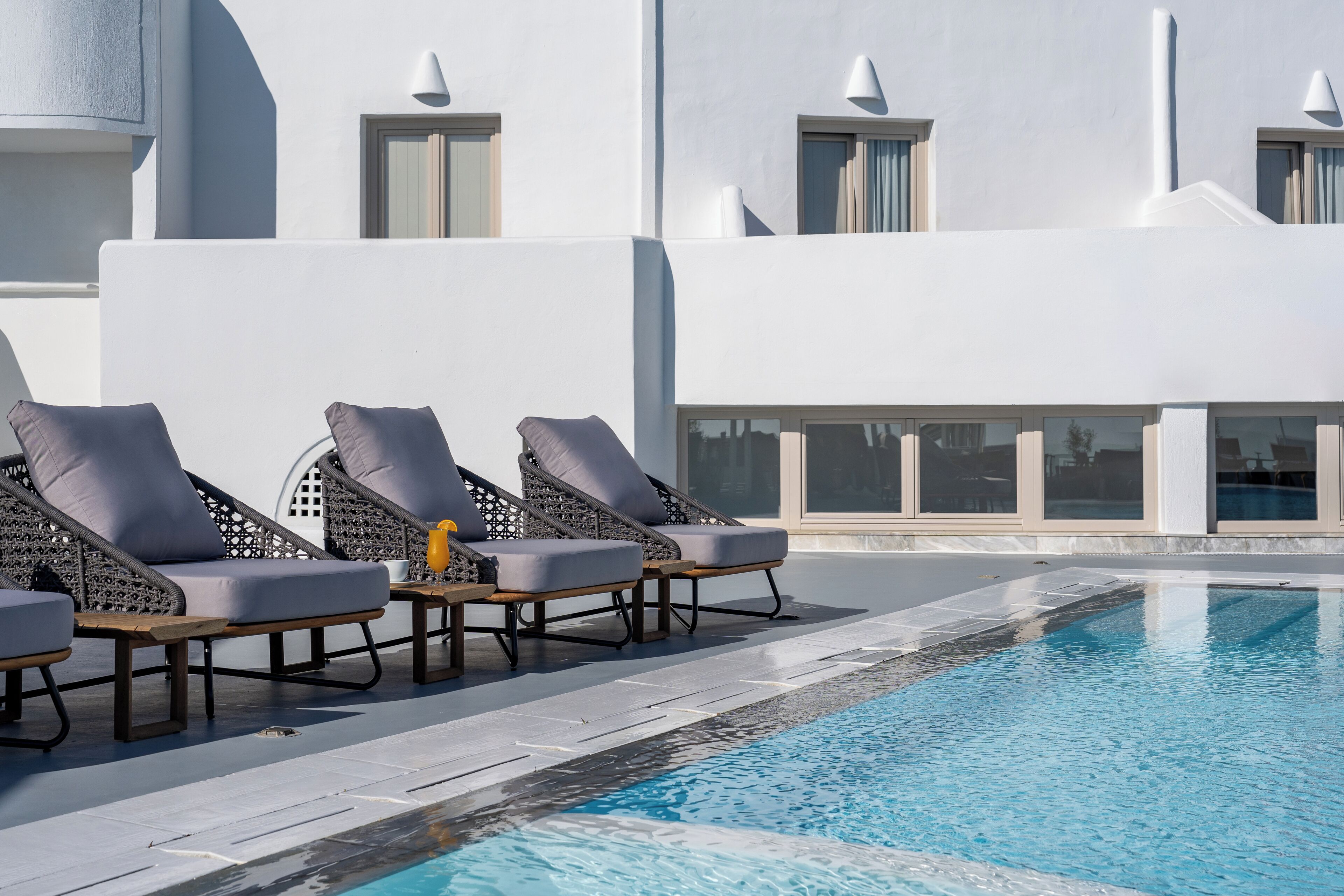 seasonal outdoor pool, pool loungers
