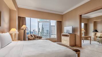 Premium bedding, down comforters, free minibar items, in-room safe