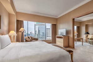 Premium bedding, down comforters, free minibar items, in-room safe