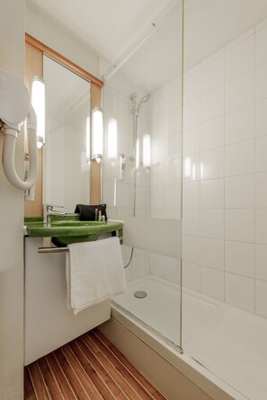 Shower, eco-friendly toiletries, hair dryer, towels