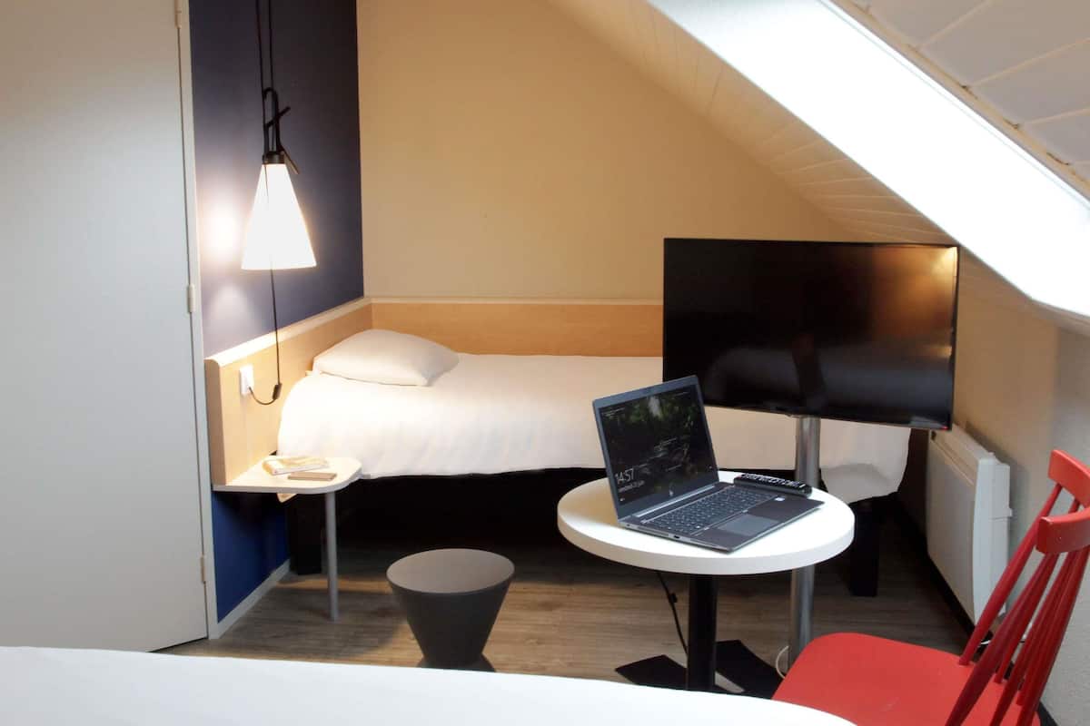 Standard Room, Multiple Beds | Blackout drapes, soundproofing, iron/ironing board