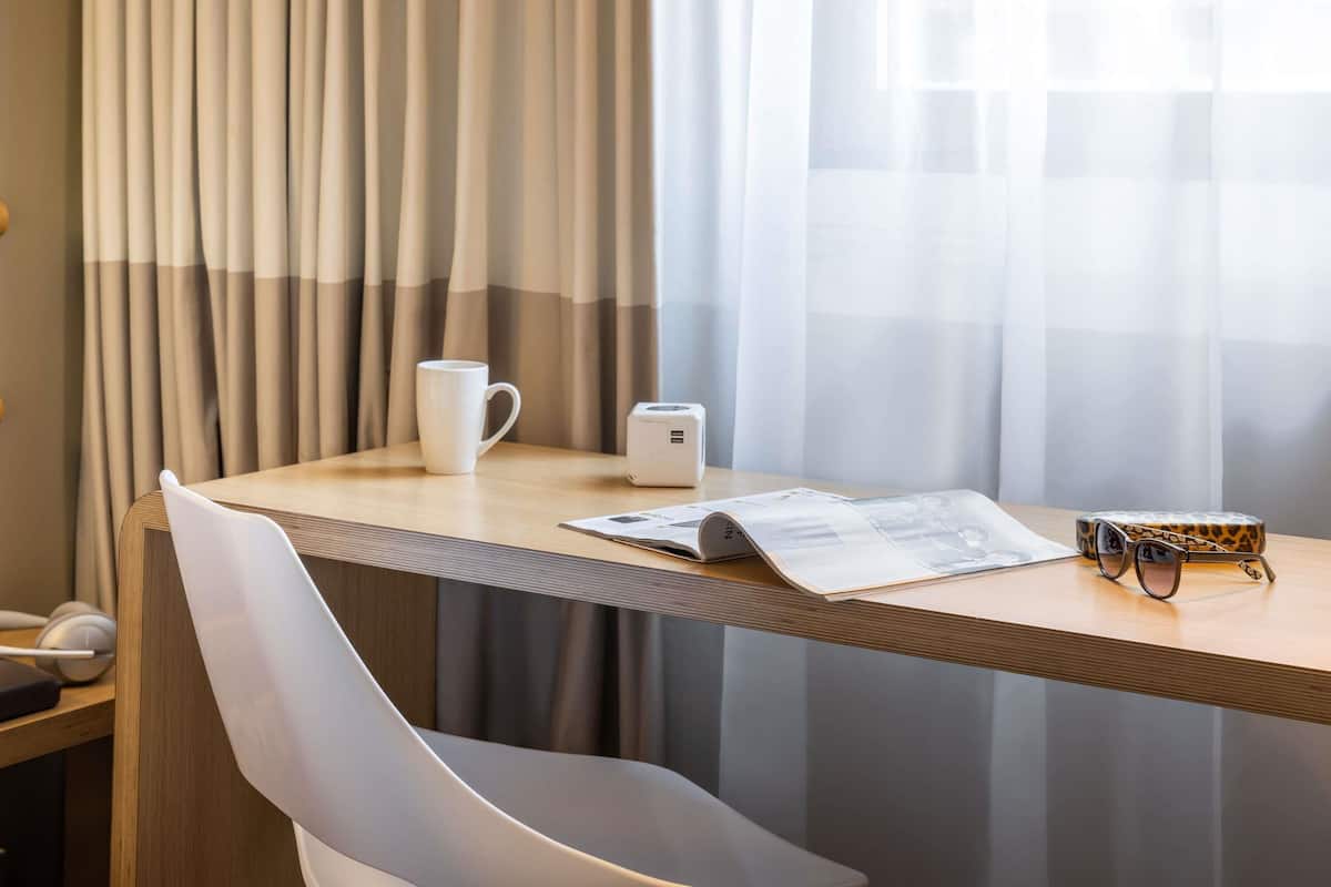 Desk, laptop workspace, blackout drapes, free WiFi