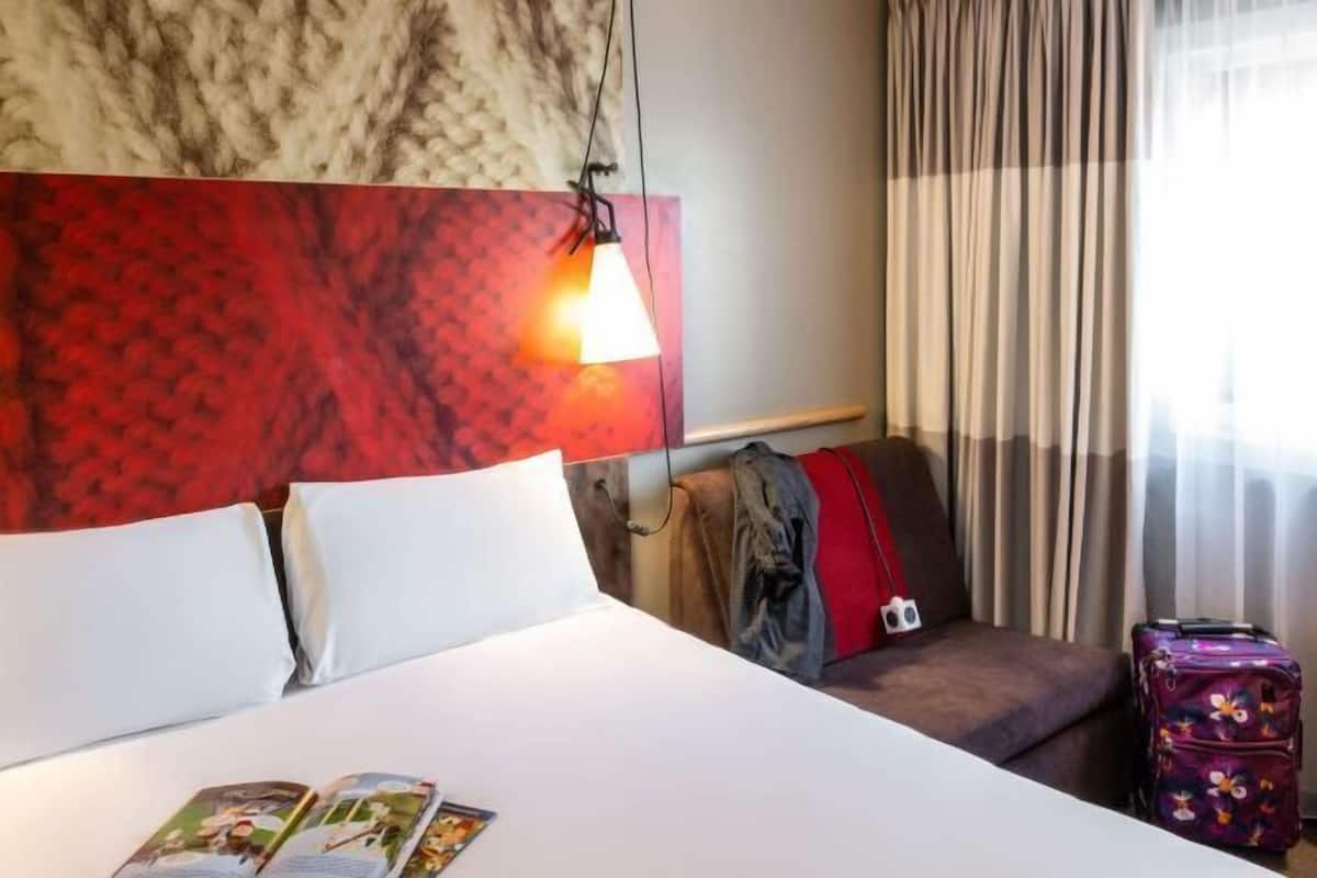 Desk, laptop workspace, blackout curtains, free WiFi