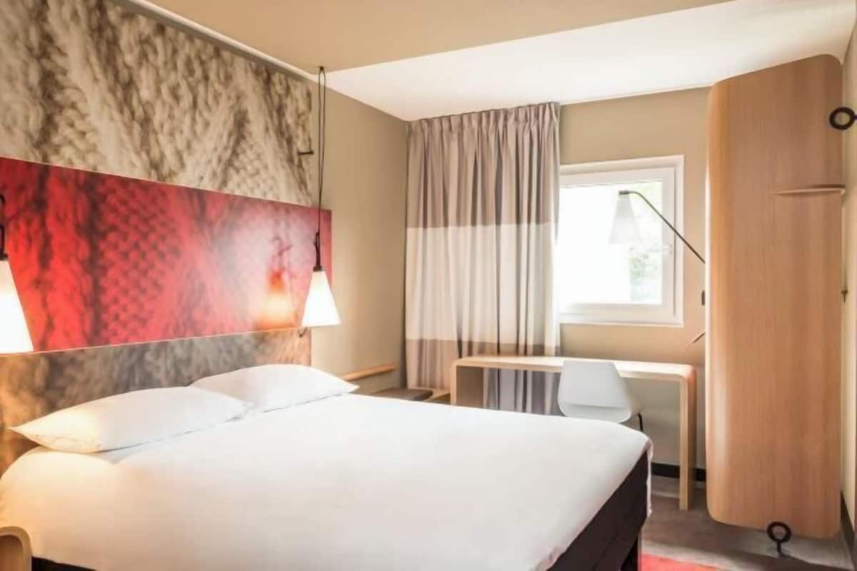 Desk, laptop workspace, blackout curtains, free WiFi