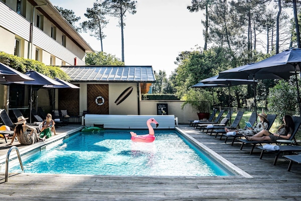 Seasonal outdoor pool, pool umbrellas, sun loungers