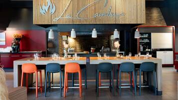 Breakfast, lunch, dinner served; international cuisine, pool views