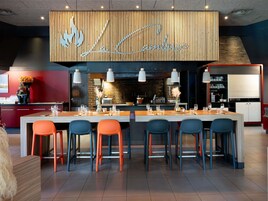 Breakfast, lunch, dinner served; international cuisine, pool views 