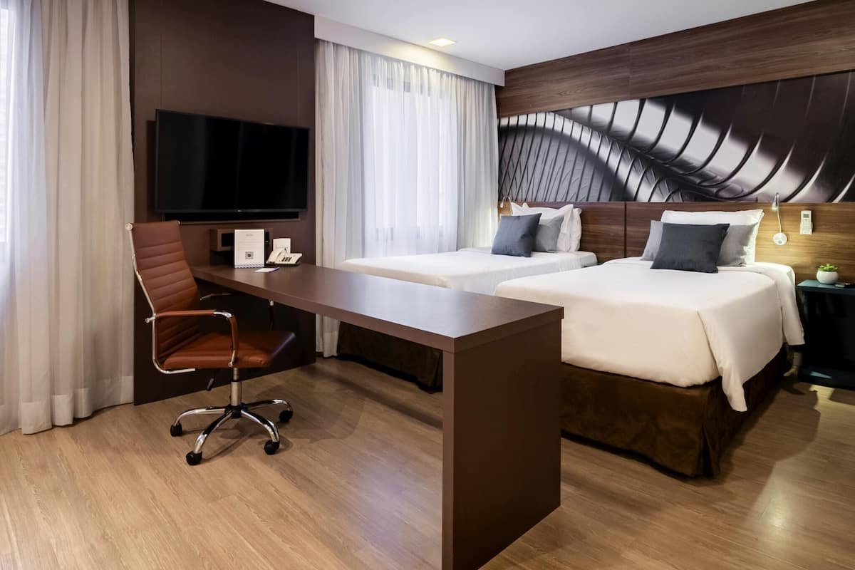 Superior Apartment, 2 Twin Beds | Minibar, in-room safe, laptop workspace, blackout drapes