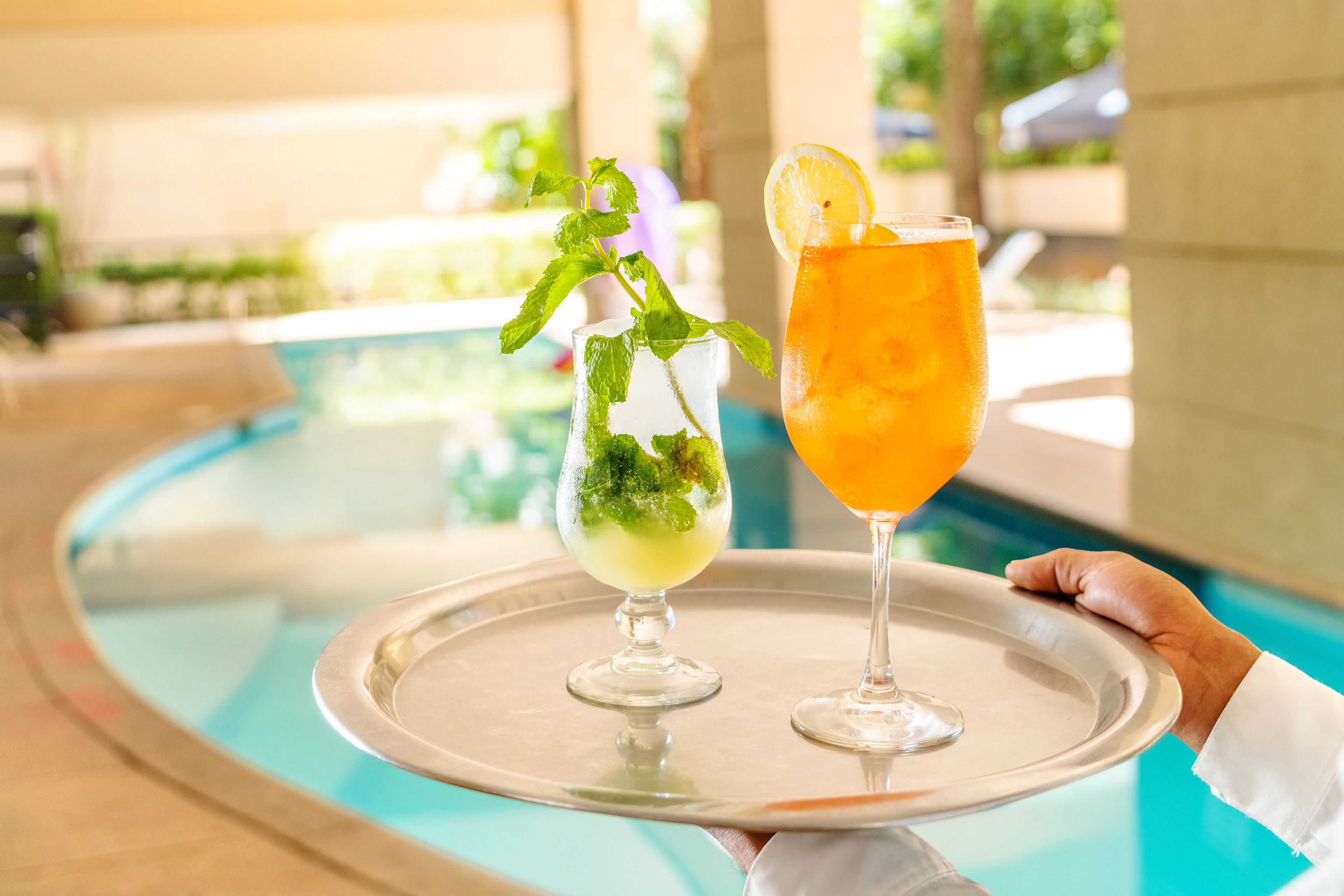 outdoor pool, open 6 am to 11:00 pm, pool loungers