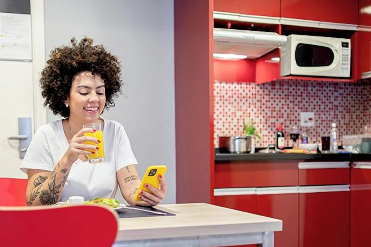 Comfort Apartment, Kitchen | Minibar, in-room safe, laptop workspace, blackout drapes