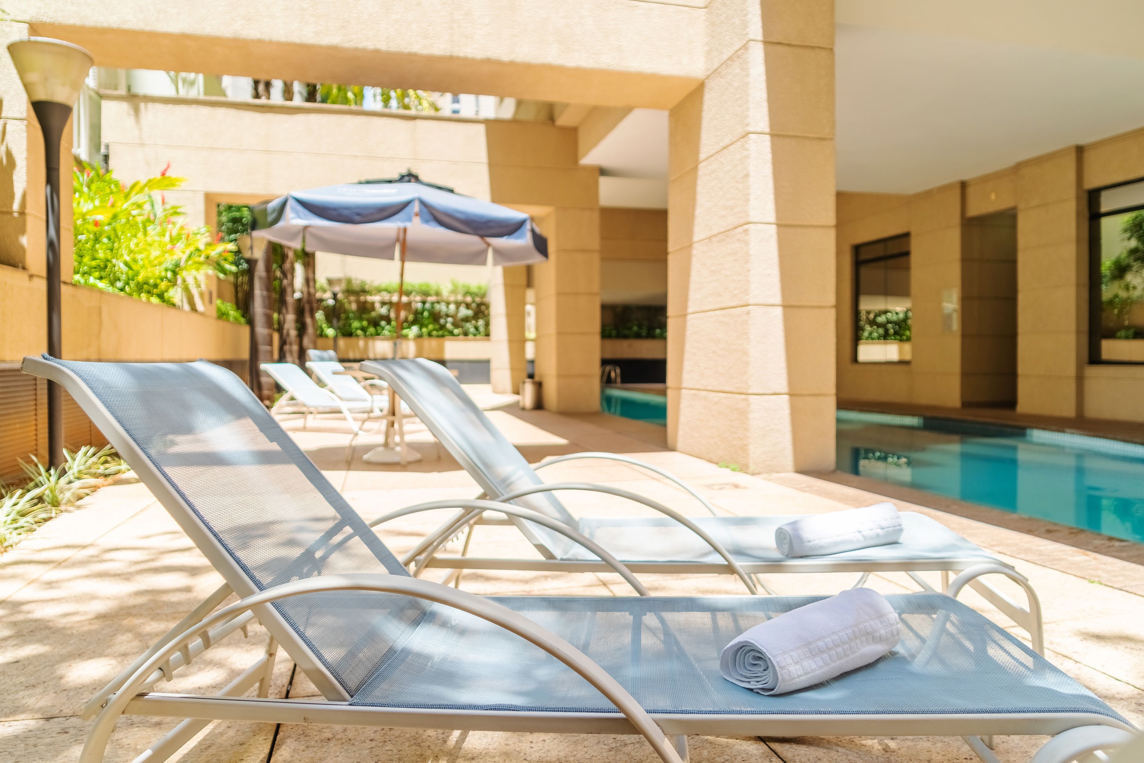 outdoor pool, open 6 am to 11:00 pm, pool loungers