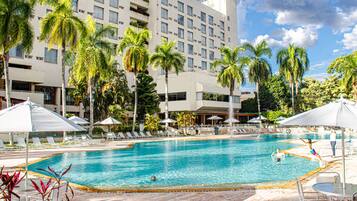 Outdoor pool, pool umbrellas, sun loungers