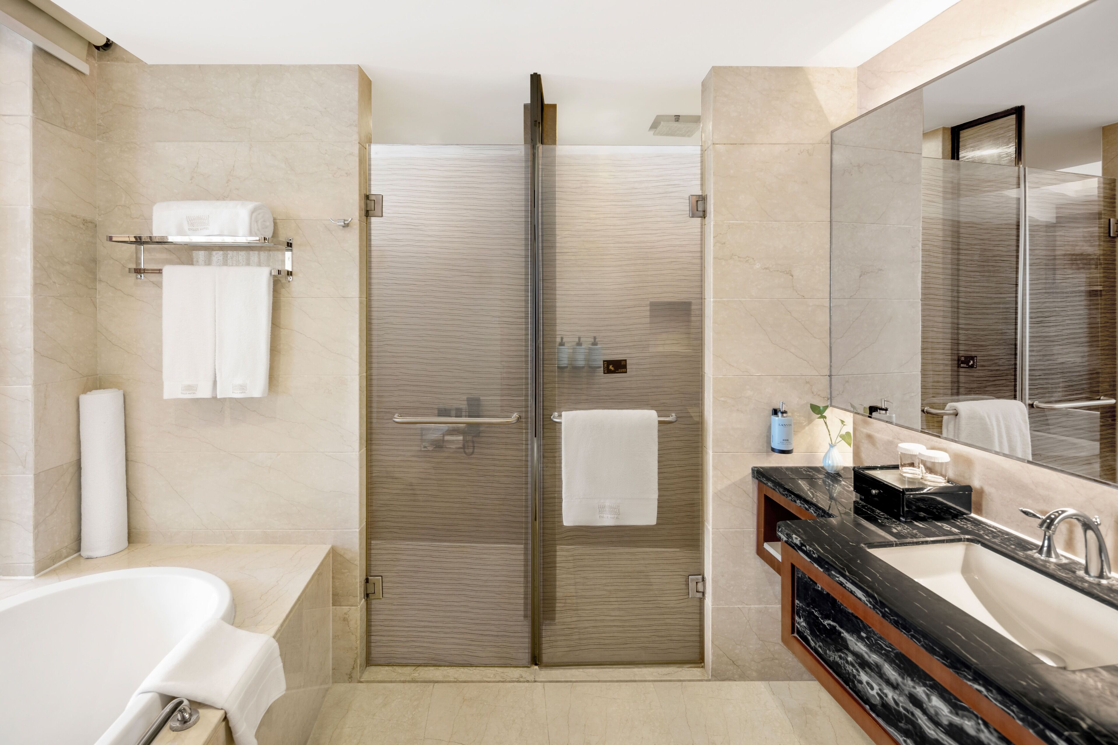 junior suite | bathroom | shower, designer toiletries, hair dryer, bathrobes