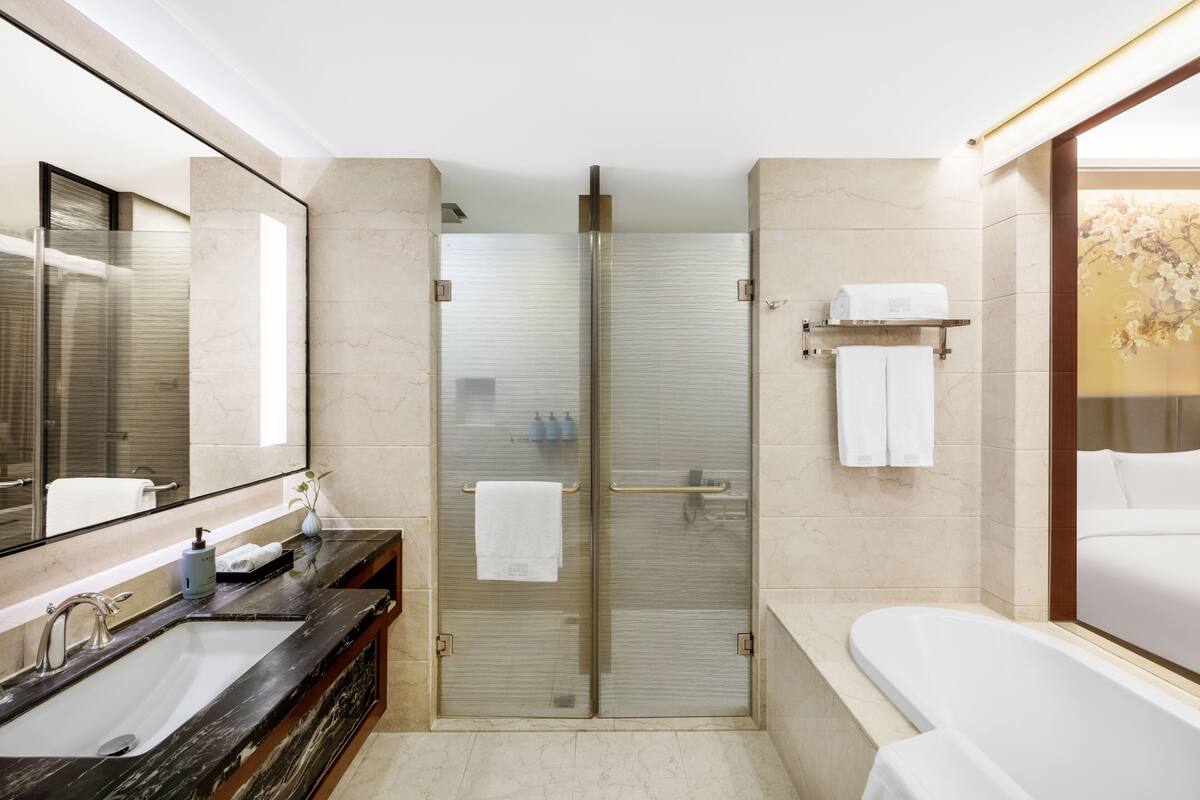 shower, designer toiletries, hair dryer, bathrobes